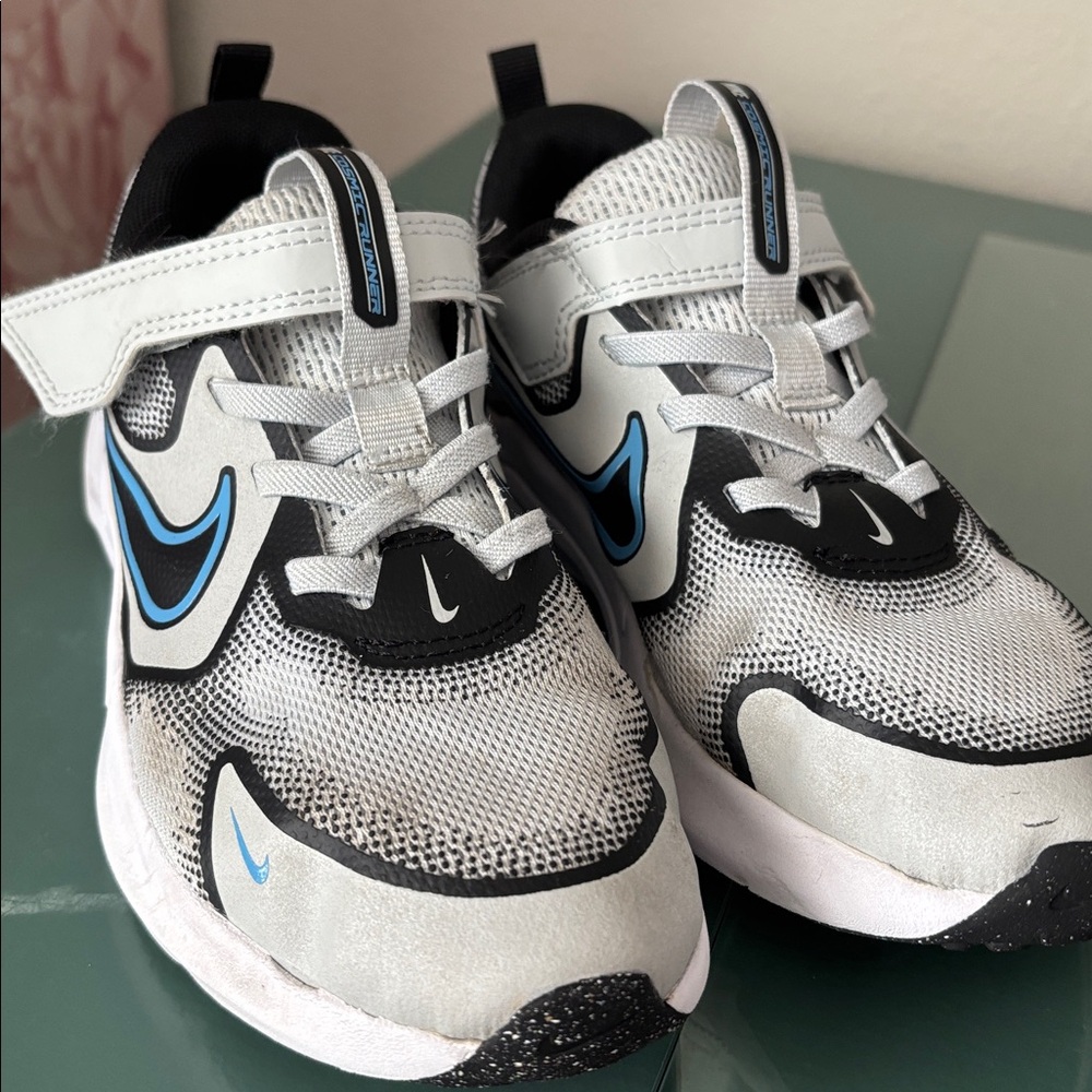 Nike Gray and Black Sneakers with Blue Highlights